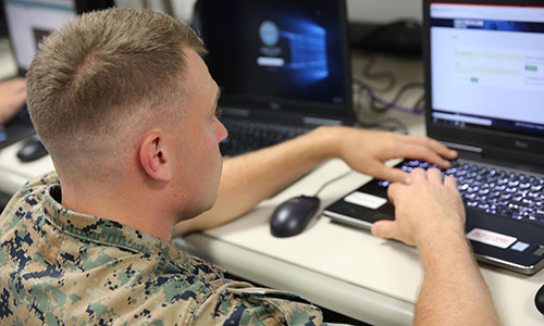 Soldier at a computer