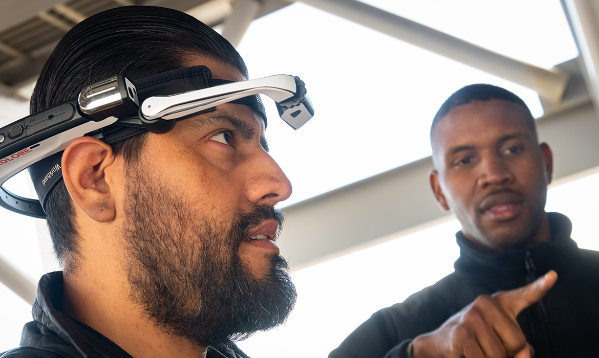 Man guides user through the new digital platform