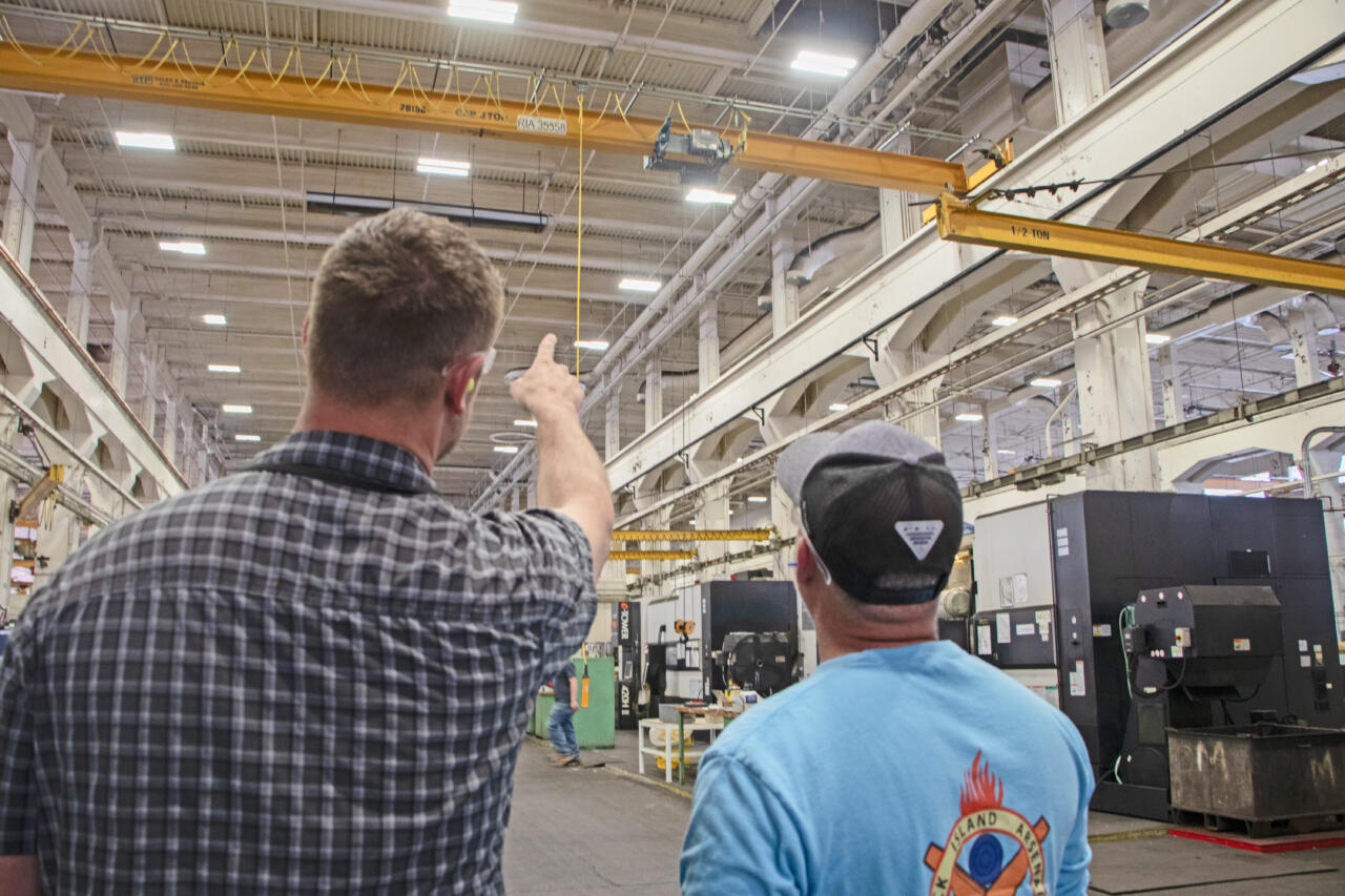 Man showing how new manufacturing system works